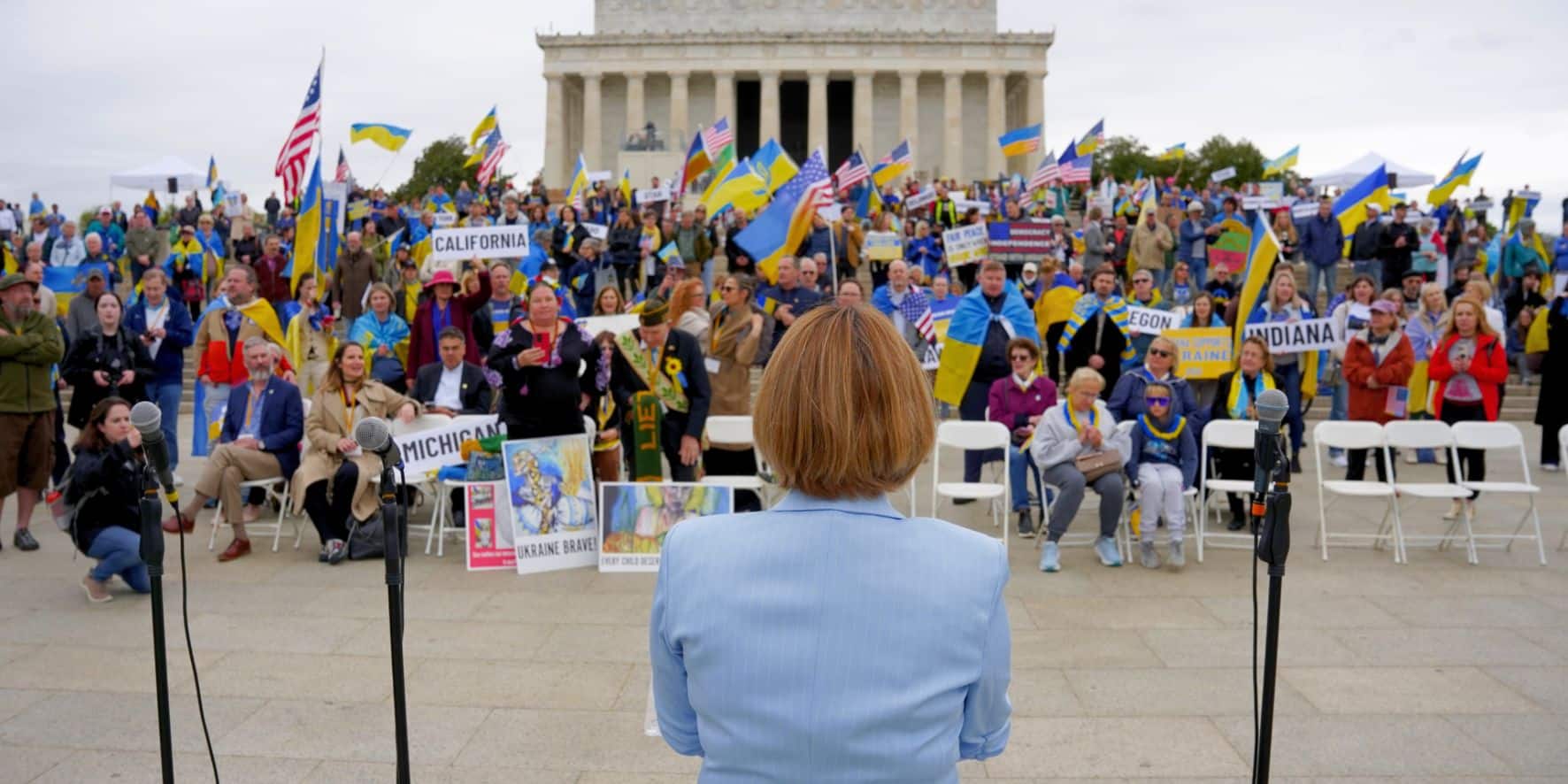 Maryna Bayduyk a president of United Help Ukraine speaks to rally attendees